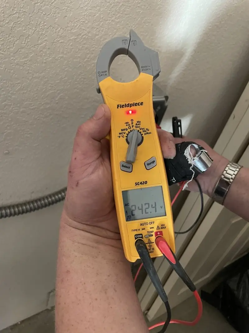 Voltage testing with clamp meter during Circuit Breaker Repair in Anthony